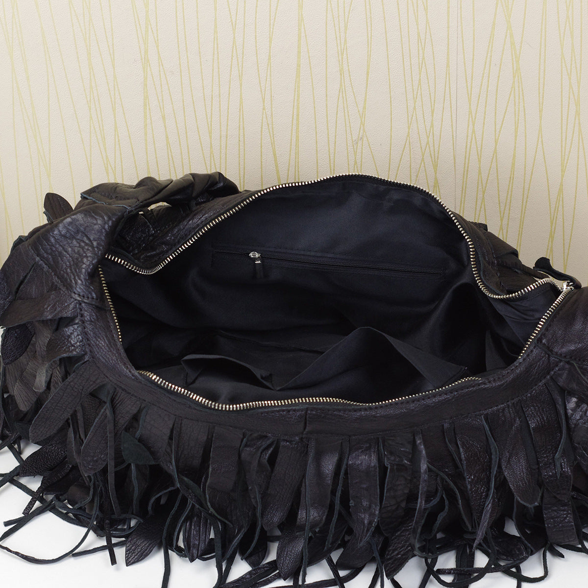 1641 sheepskin tassle hobo bag