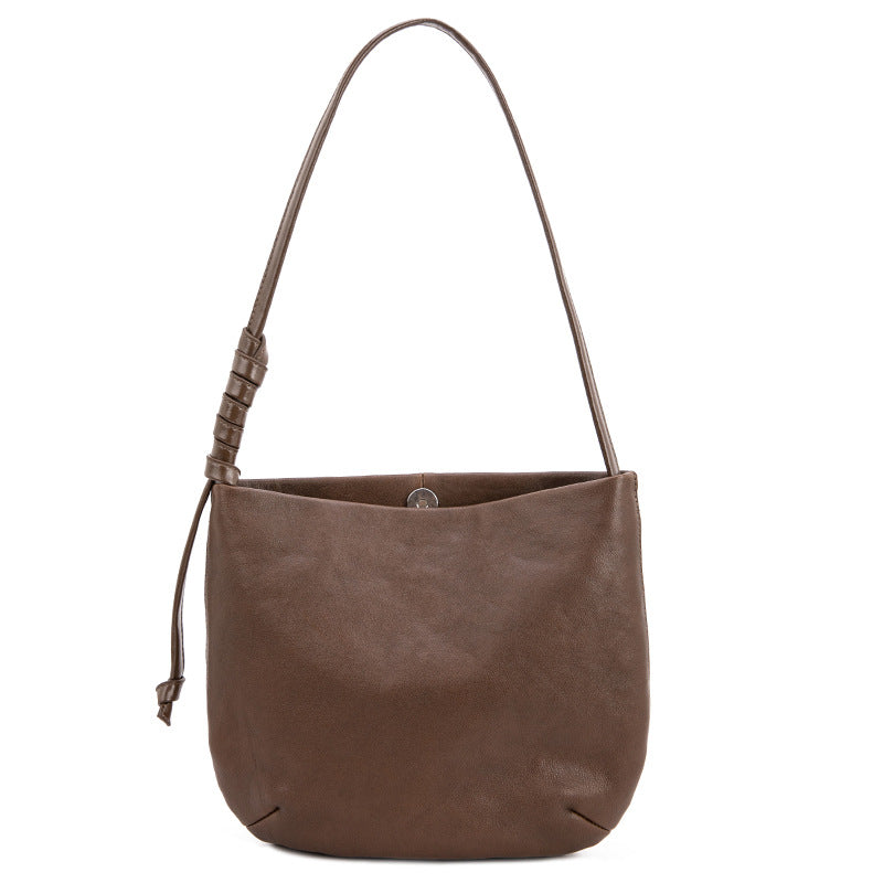 1834 cowhide solid bucket handbag