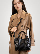 2658 cow leather woven handbag