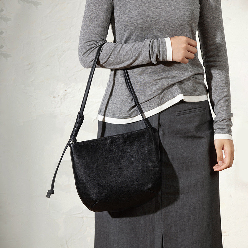 1834 cowhide solid bucket handbag