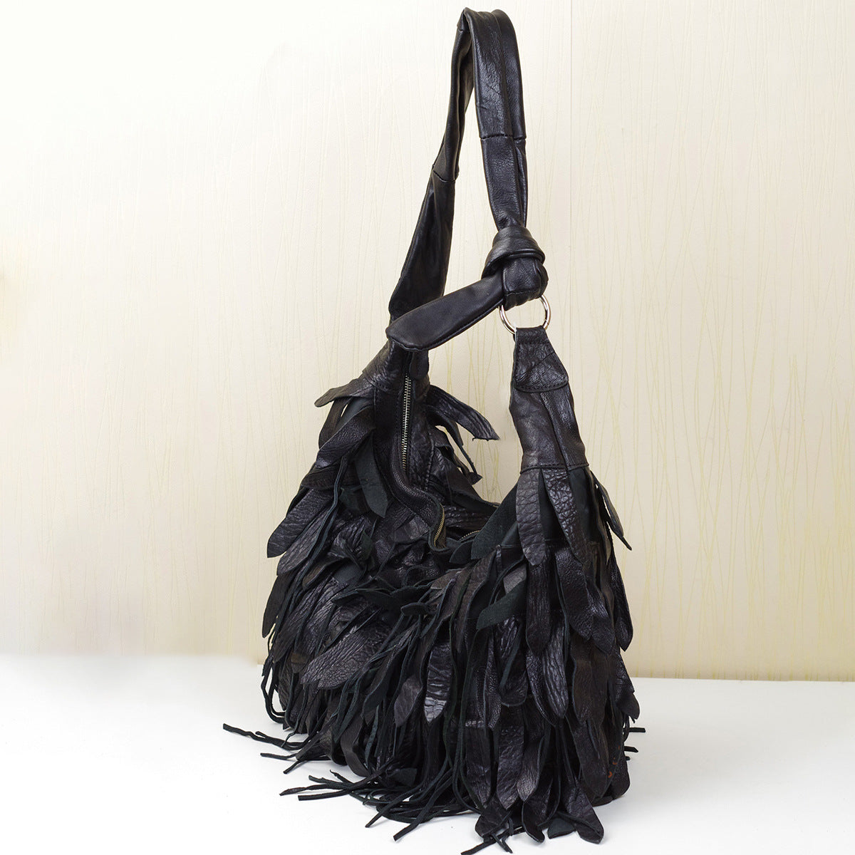 1641 sheepskin tassle hobo bag