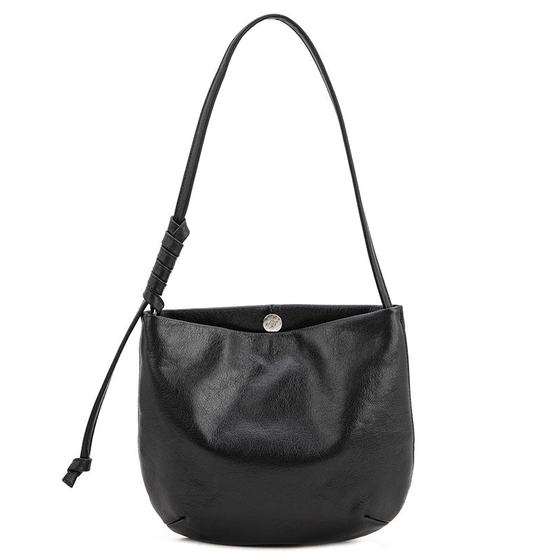 1834 cowhide solid bucket handbag
