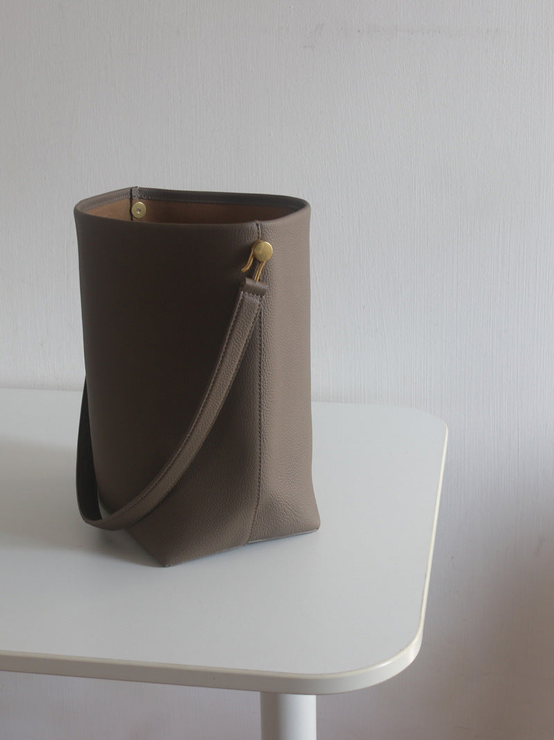 1330 cow leather taxture women handbag