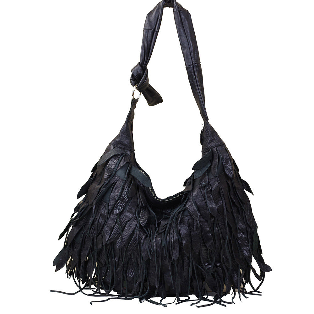 1641 sheepskin tassle hobo bag