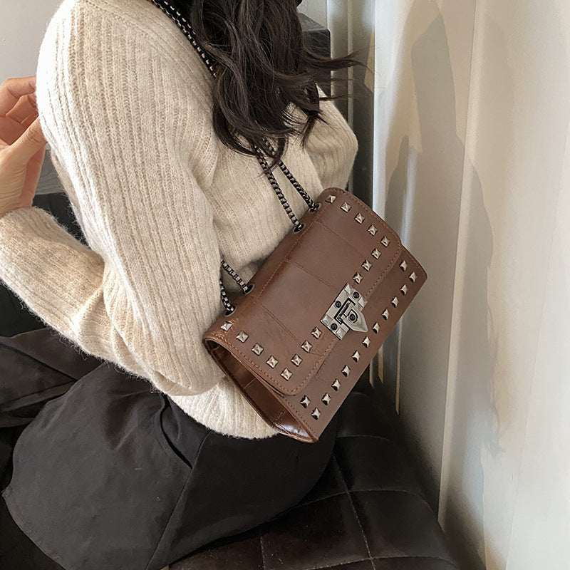 1994-1 rivet leather crossbody bag