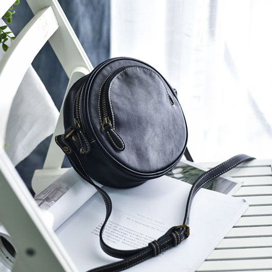1635 round leather crossbody bag