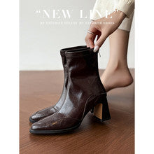 2723 pointed-toe genuine leather boots