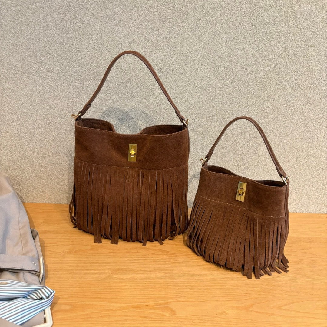 962 suede leather tassel bucket handbag