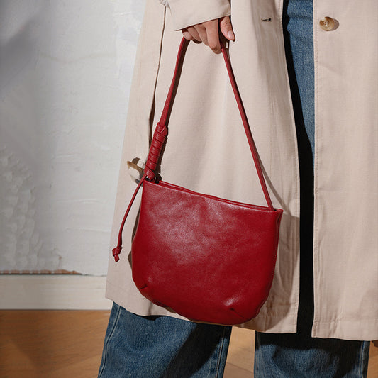 1834 cowhide solid bucket handbag