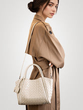 2658 cow leather woven handbag