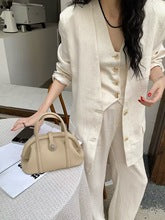 2252 small cowhide shell handbag